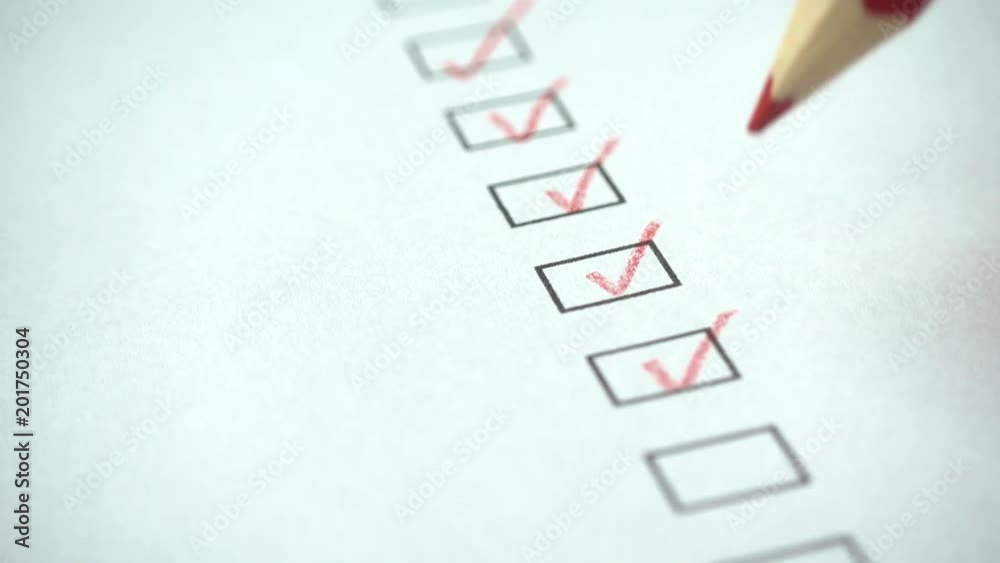 A person checking off a to do list with red pencil. Check all the boxes of a checklist, close-up, 4k