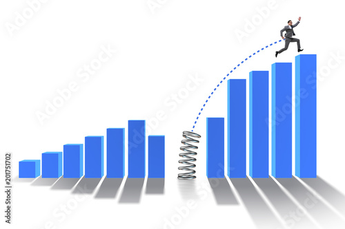 Business people jumping over bar charts © Elnur