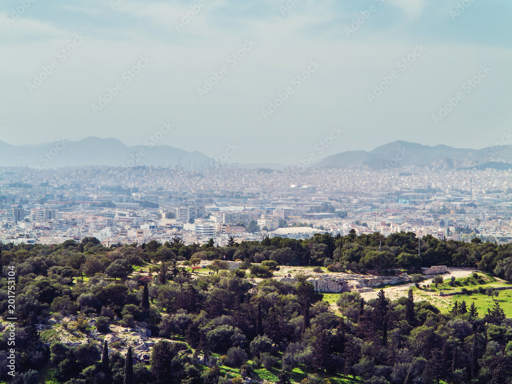 Athens, Greece, 03.03.2018: View of Athens city with Lycabettus hill in the background. view of Athens city with Plaka neighborhood