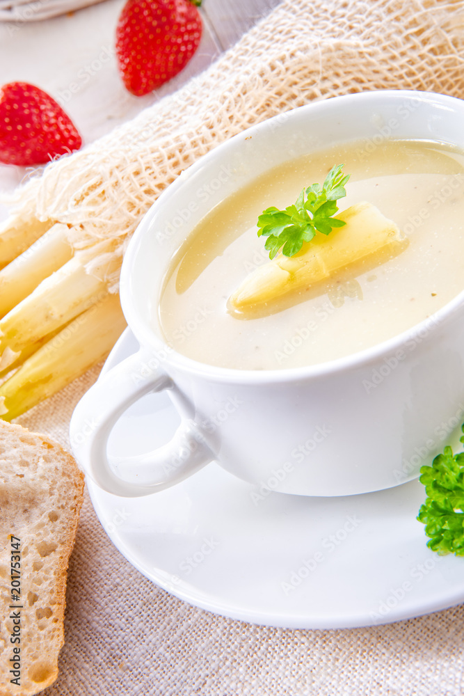 asparagus cream soup with capers and fresh baguette asparagus cream soup with capers and fresh baguette
