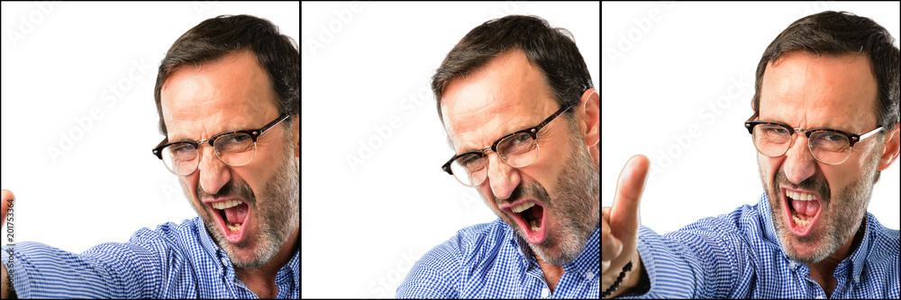 Middle age handsome man closeup stand happy and positive with thumbs up approving with a big smile expressing okay gesture Middle age handsome man closeup stand happy and positive with thumbs up approving with a big smile expressing okay gesture