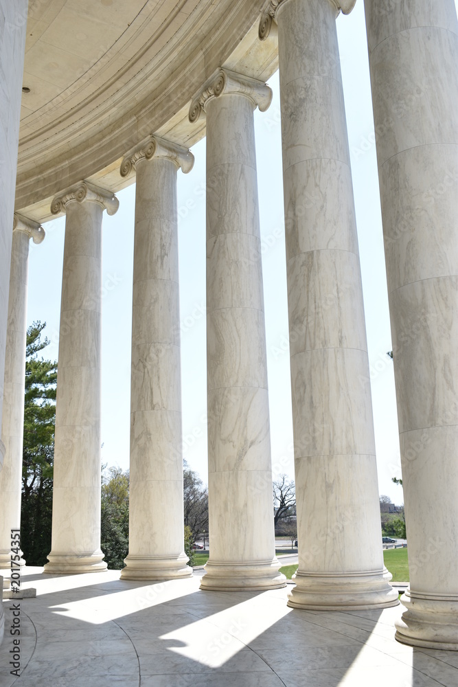 Closeup of white stone pillars at the Jefferson Monument on Lake Tidal Basin in Washington D.C in the USA