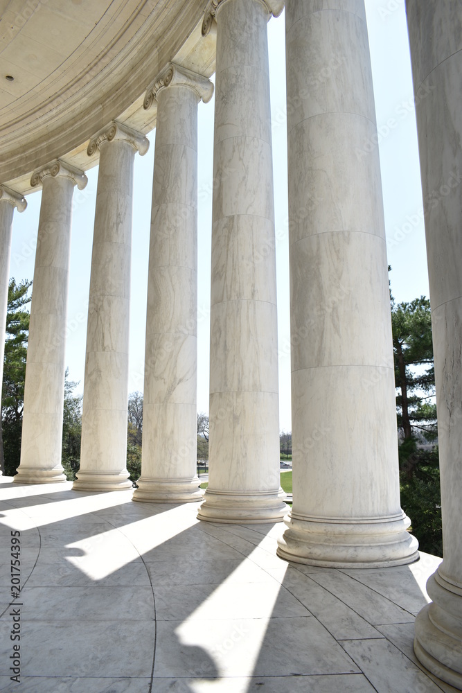 Closeup of white stone pillars at the Jefferson Monument on Lake Tidal Basin in Washington D.C in the USA