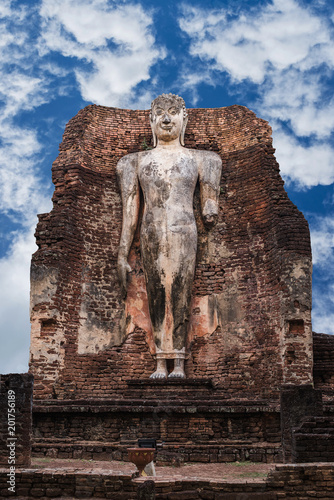 Buddha statue ancient with blue sky background