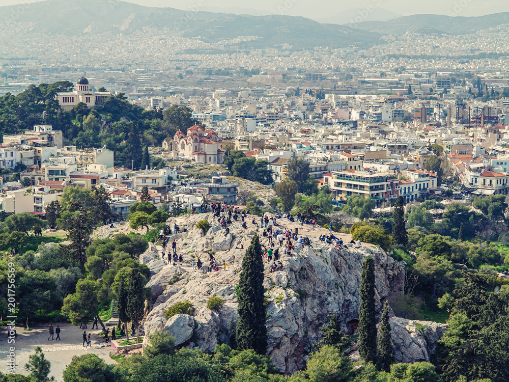 Athens, Greece, 03.03.2018: View of Athens city with Lycabettus hill in the background. view of Athens city with Plaka neighborhood