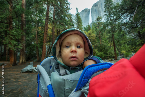 A father with baby son visit Yosemite National Park in Californai, USA photo