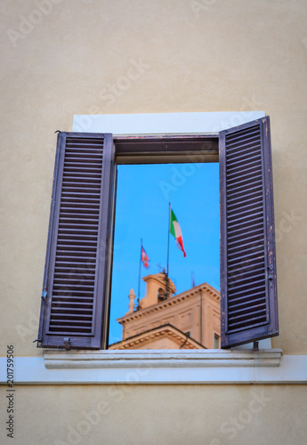 Window  with old wood shutters in Italy