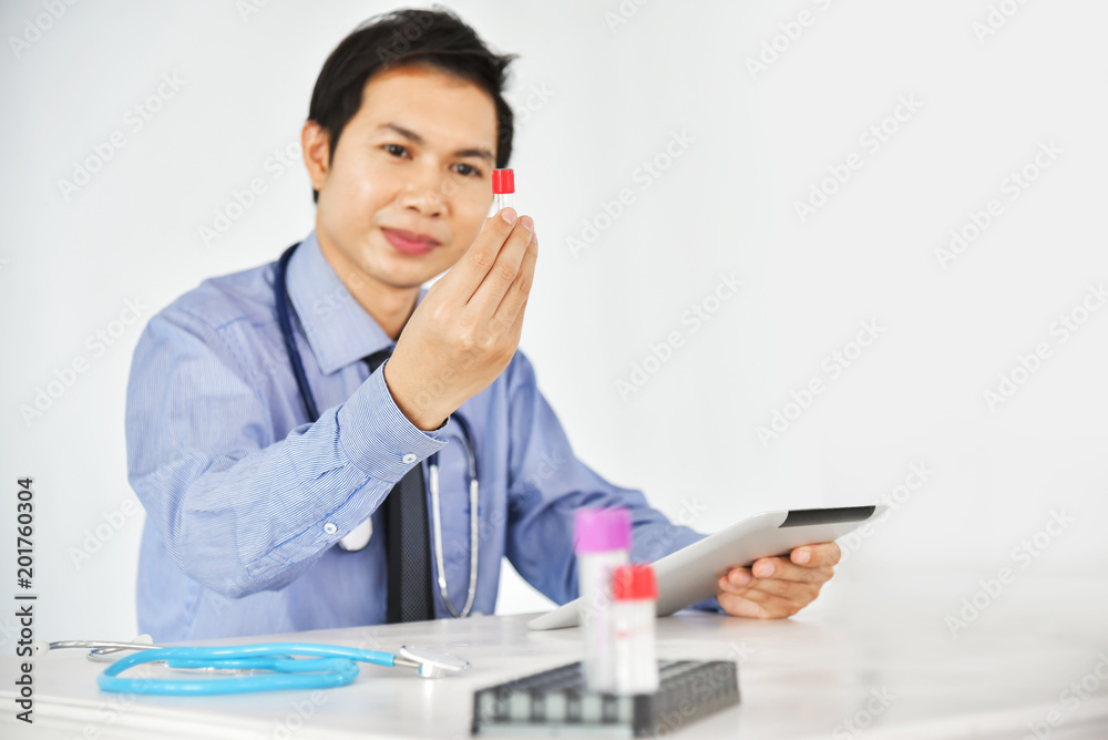 Asian Male Research Scientist is working. Asian Male Research Scientist is working.