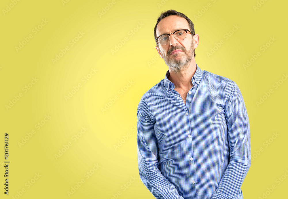 Handsome middle age man confident and happy with a big natural smile laughing Handsome middle age man confident and happy with a big natural smile laughing