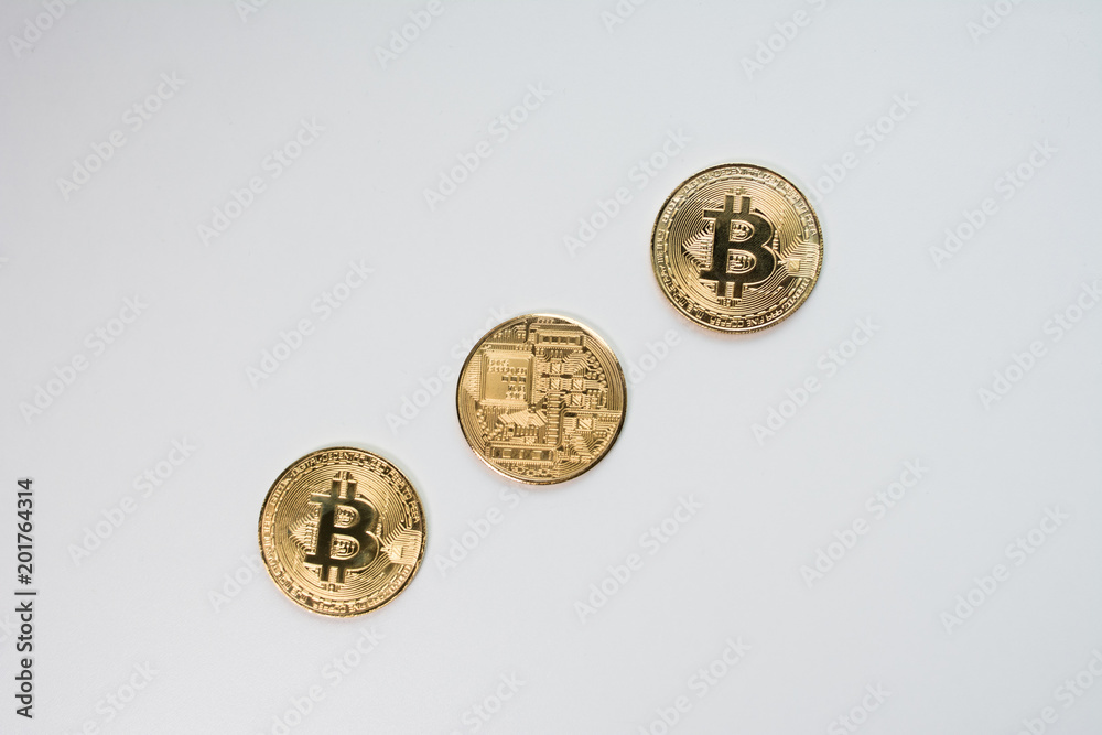 Face and back of the crypto currency golden bitcoin isolated on white background. The concept of virtual international currency and business on the Internet. Face and back of the crypto currency golden bitcoin isolated on white background. The concept of virtual international currency and business on the Internet.