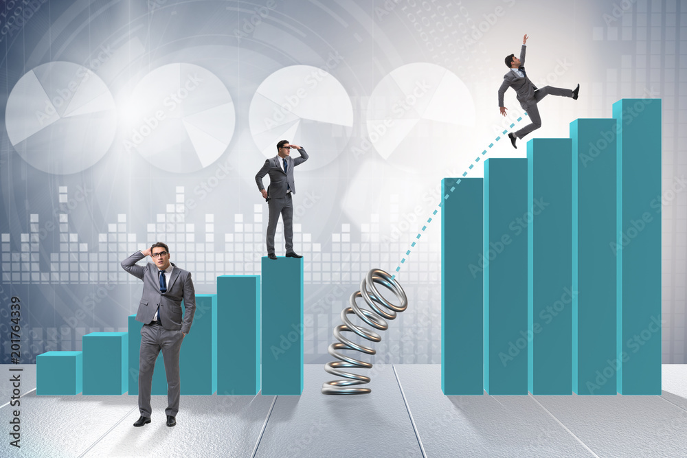 Business people jumping over bar charts Business people jumping over bar charts