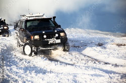 SUV on snow photo