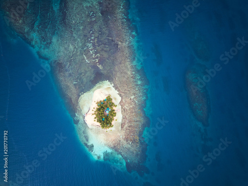 Small island on coral reef