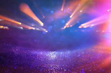 glitter vintage background. defocused. neon lights