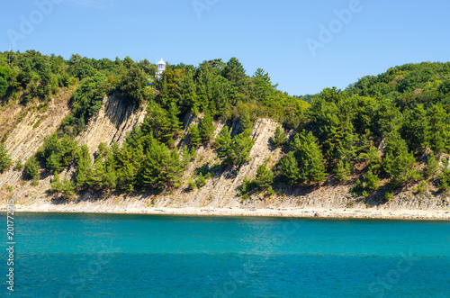 Green island coastline near blue sea natural calm background