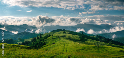 Breathtaking panorama of morning wild nature high in mountains photo