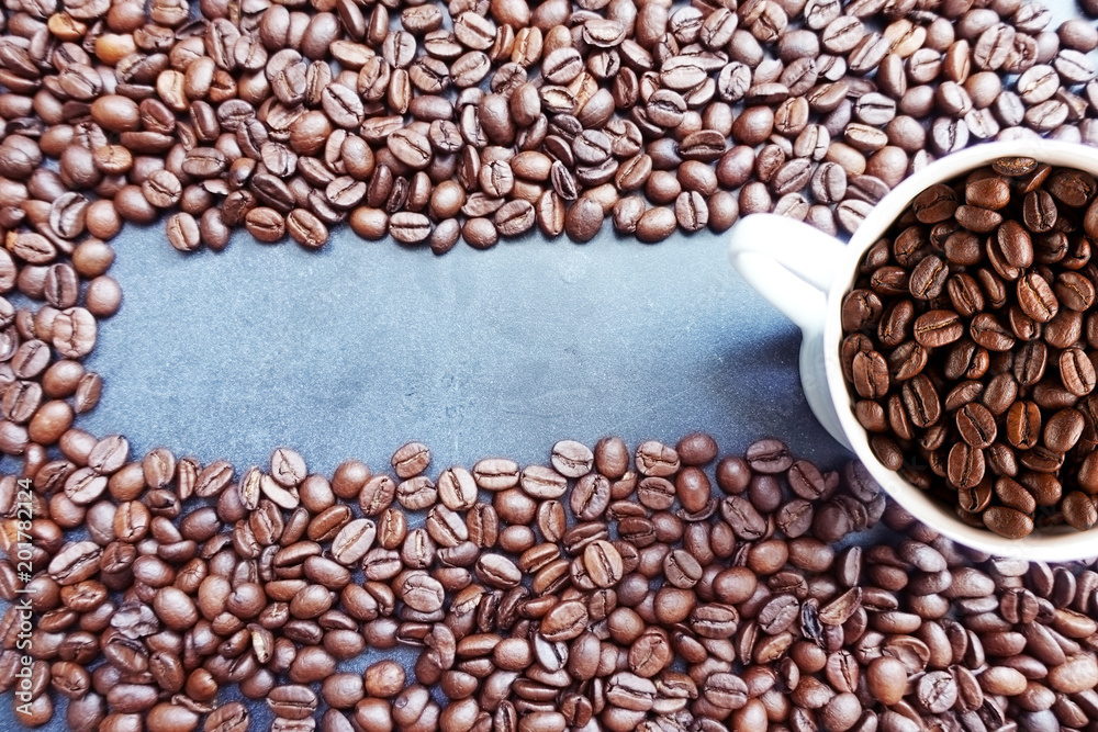 Top view of roasted coffee beans forming a frame or copy space
Top view of roasted coffee beans forming a frame or copy space