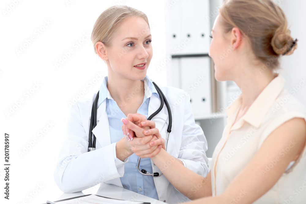 Doctor and patient during personal consulting in hospital Doctor and patient during personal consulting in hospital