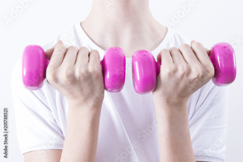 hands with weights exercising bodybuilding