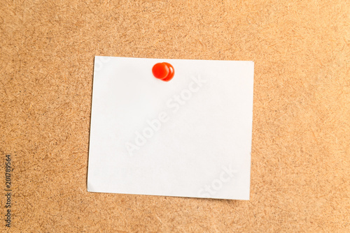 white sticker for notes on a cardboard background