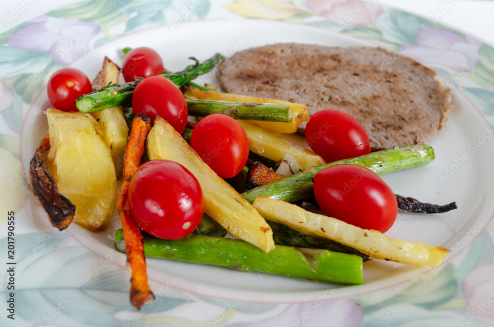 a plate with meat and vegetables a plate with meat and vegetables