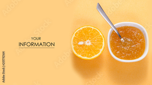 Orange jam in a white bowl with orange fruit pattern