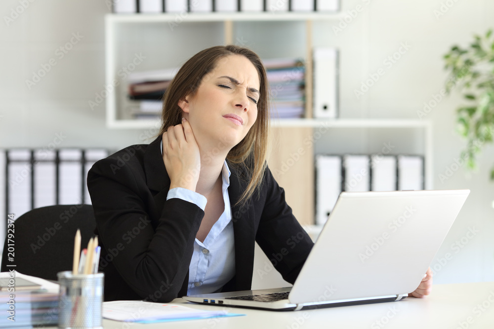Office worker suffering neck ache Office worker suffering neck ache