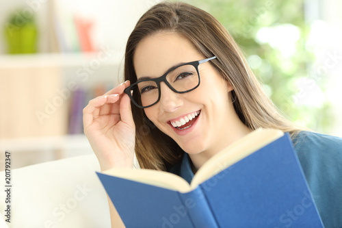 Happy woman wearing eyeglasses with perfect smile