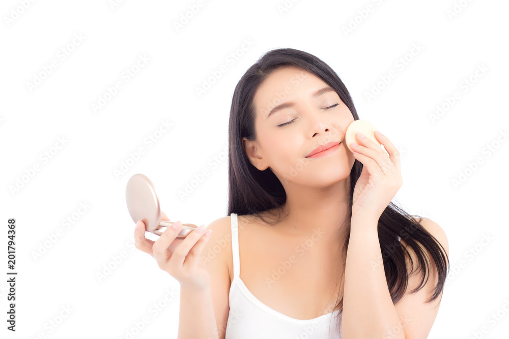 Portrait of beautiful asian woman applying powder puff at cheek makeup of cosmetic, beauty of girl with face smile isolated on white background, wellness and healthcare concept. Portrait of beautiful asian woman applying powder puff at cheek makeup of cosmetic, beauty of girl with face smile isolated on white background, wellness and healthcare concept.