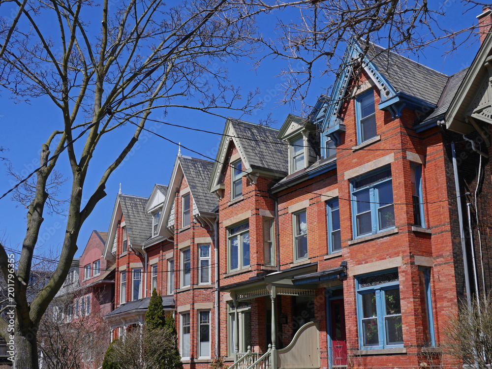 renovated Victorian row houses with gables