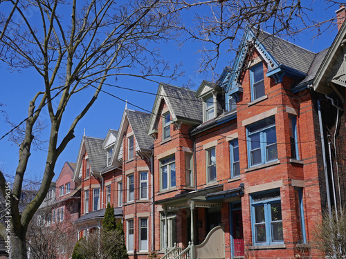 renovated Victorian row houses with gables © Spiroview Inc.