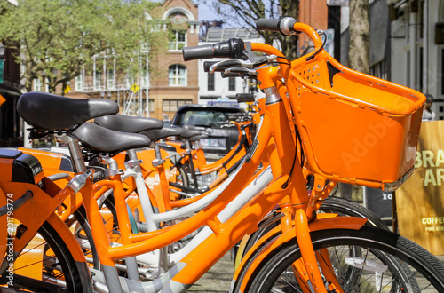 Orange Bicycle Rental Kiosk in the City © Mark