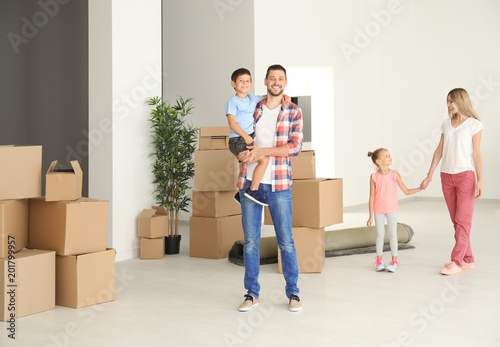 Happy family in new flat