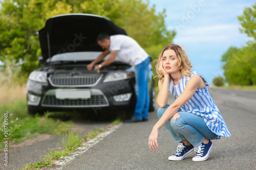 Upset young woman and man w...