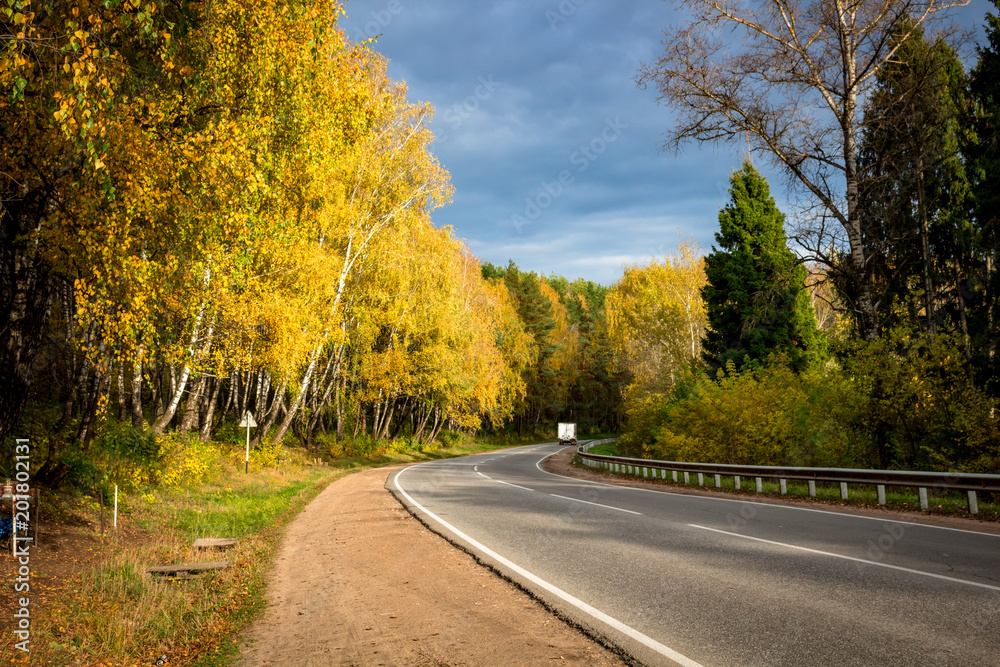 Highway with a beautiful turn. Autumn palette
Highway with a beautiful turn. Autumn palette