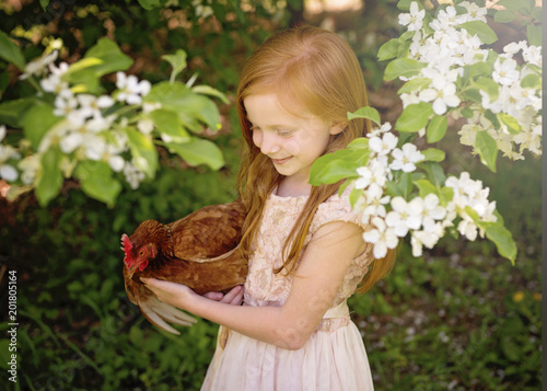 Little Girl With Chicken