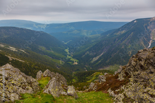 View in to a valley from Snezka Mountainin Krkonose National Park, Czech Republic, Europe photo