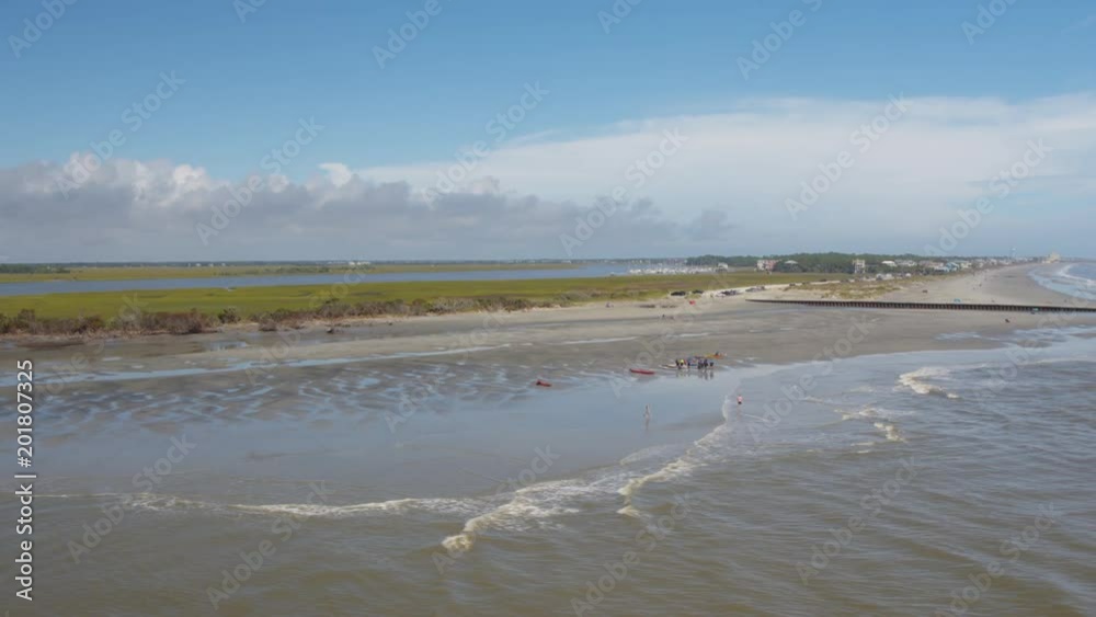 South Carolina Charleston Folly Beach Aerial v65 Flying low over Folly Beach shoreline with people 10/17 South Carolina Charleston Folly Beach Aerial v65 Flying low over Folly Beach shoreline with people 10/17