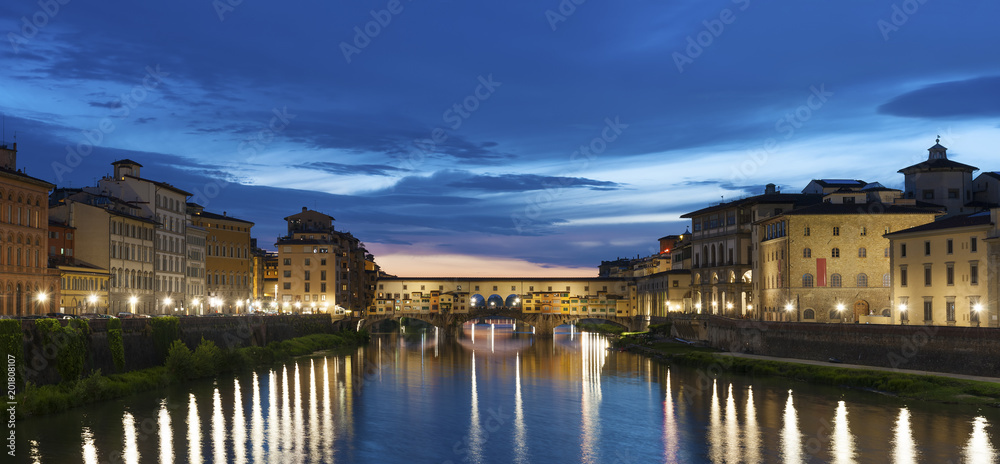 Ponte Vecchio - the bridge market in midtown of Florence, Tuscany, Italy at dusk