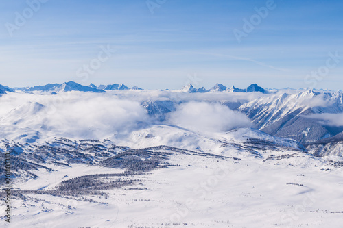 An aerial view of the Rocky Mountains in Alberta, Canada in winter © Tom Nevesely