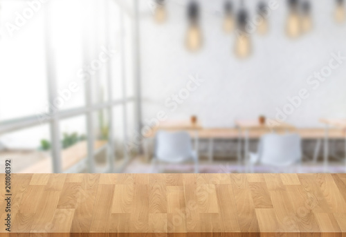 Fototapeta Naklejka Na Ścianę i Meble -  Wooden board empty table  window blurred background can be used for display or montage your products and Mock up