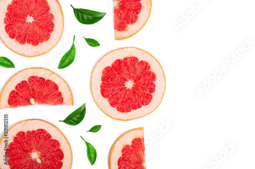 Grapefruit slices with leaves isolated on white background with copy space for your text. Top view. Flat lay pattern