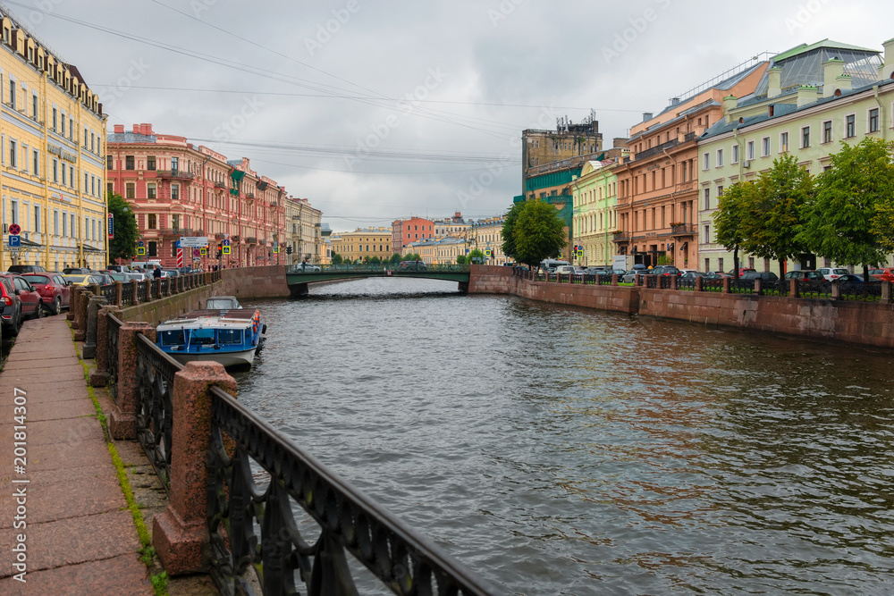 RUSSIA, SAINT PETERSBURG - AUGUST 18, 2017:  View of Moika river embankment on a rainy summer day