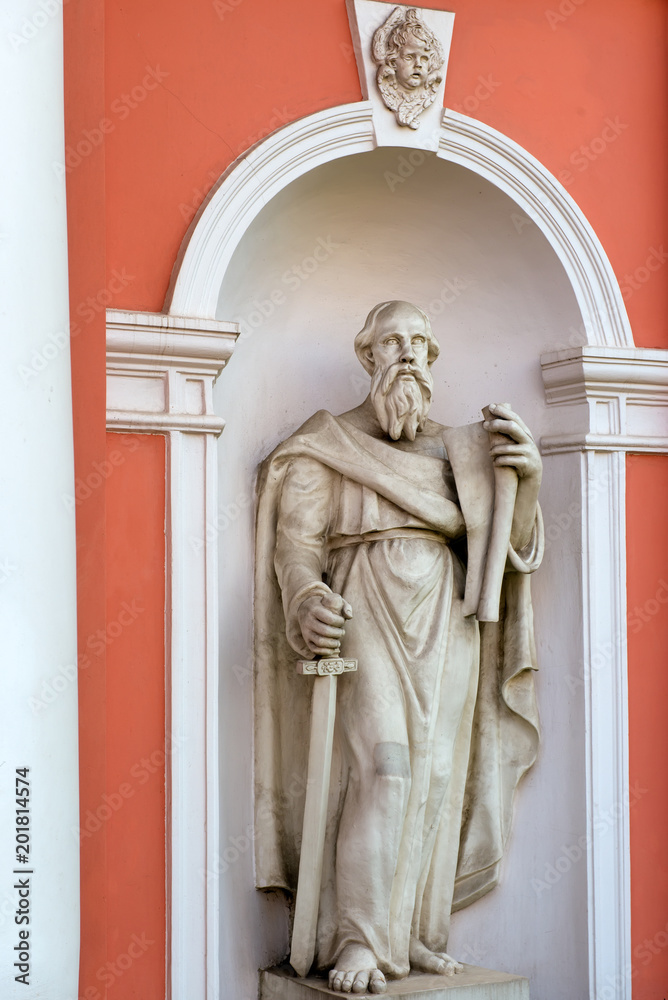 RUSSIA, SAINT PETERSBURG - AUGUST 18, 2017: Statue of St. Paul in the niche of the bell tower (1812) of Holy Cross Cossack Petersburg