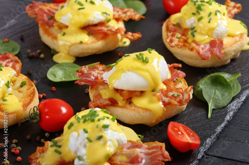 eggs benedict on a stone tray