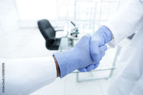 hand in the medical glove  handshake 