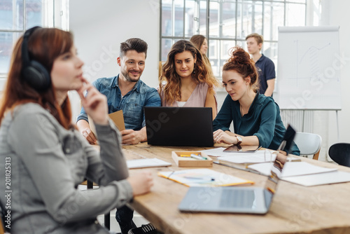 Group of young students or business people