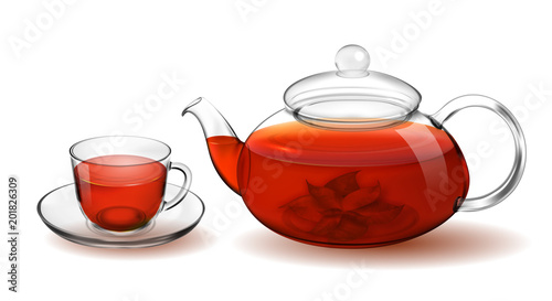 Transparent glass teapot and cup with tea isolated on white