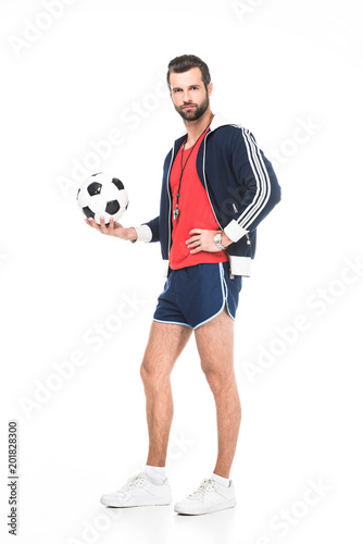 bearded soccer coach holding ball, isolated on white