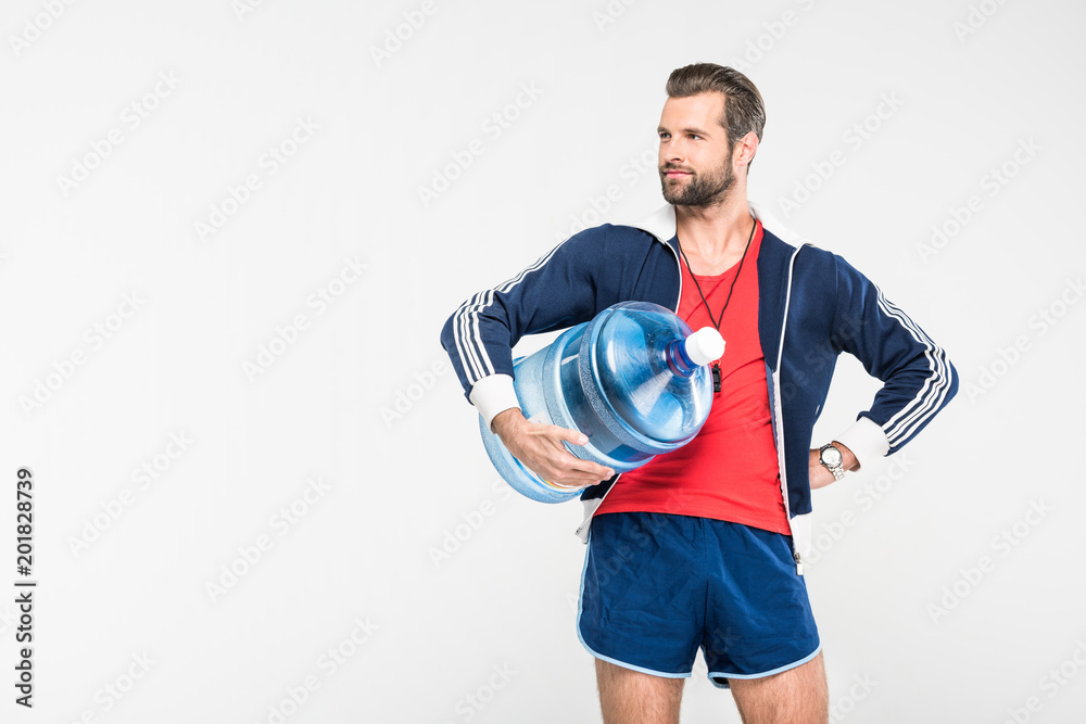 sportive trainer with big bottle of water, isolated on white